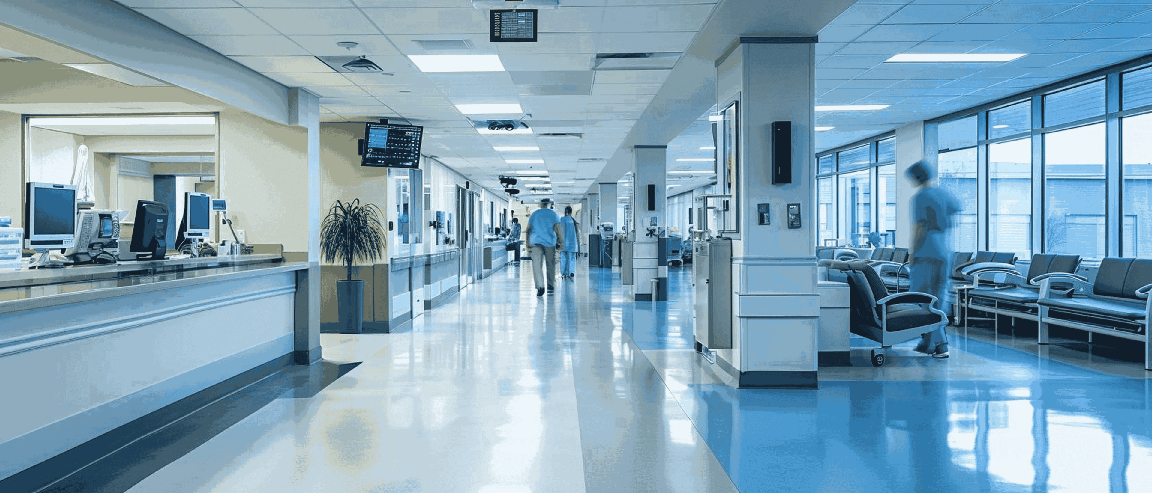 Hospital hallway with people walking down
